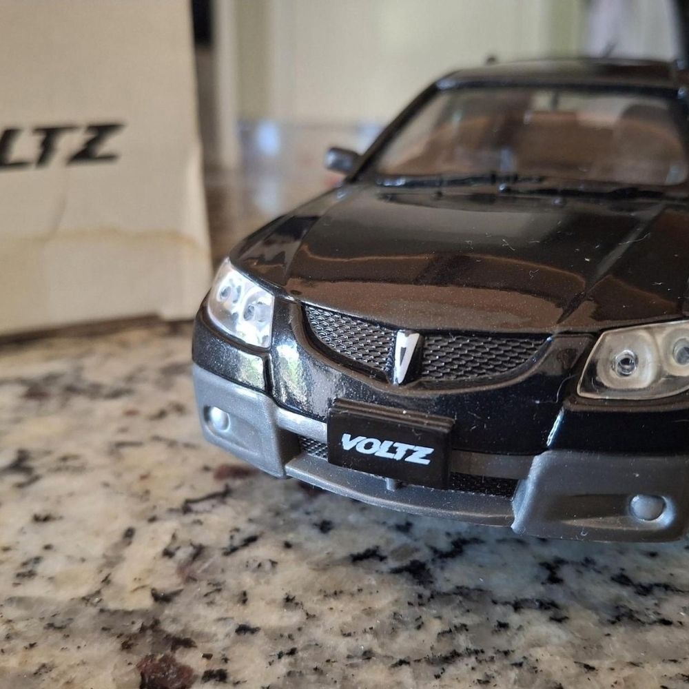 Black Model Car with Detailed Silver Accents